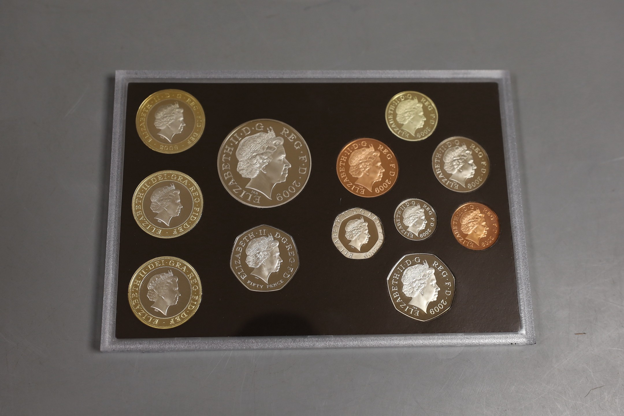 A cased Royal Mint UK proof coin year set for 2009 including the scarce Kew Gardens 50 pence